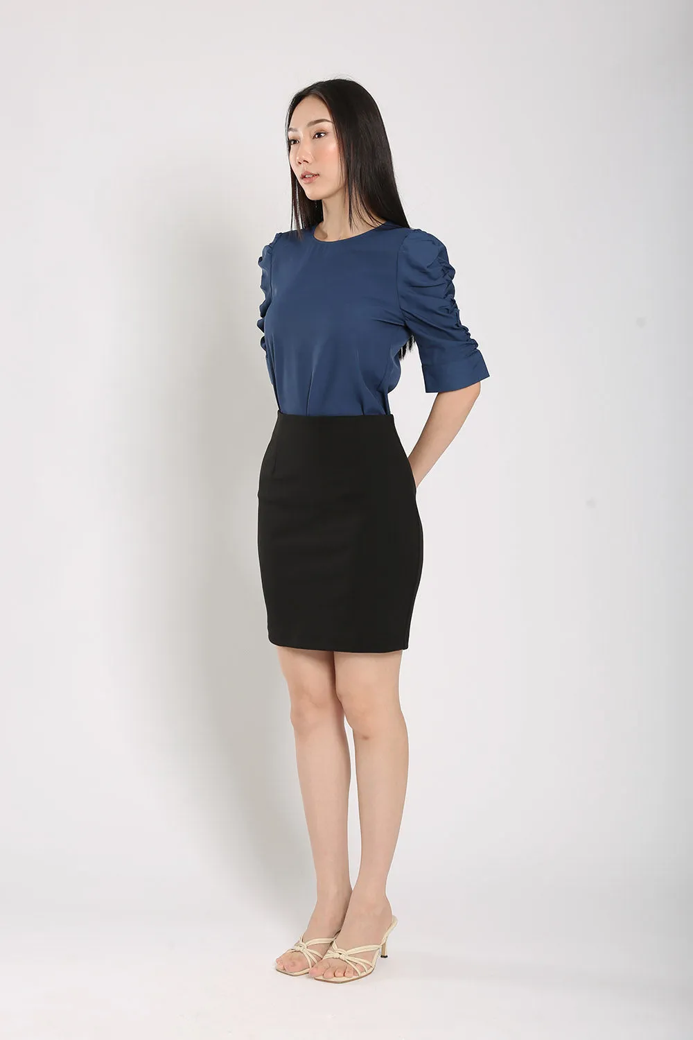 Kamille Ultra-Stretch Pencil Mini Skirt in Black