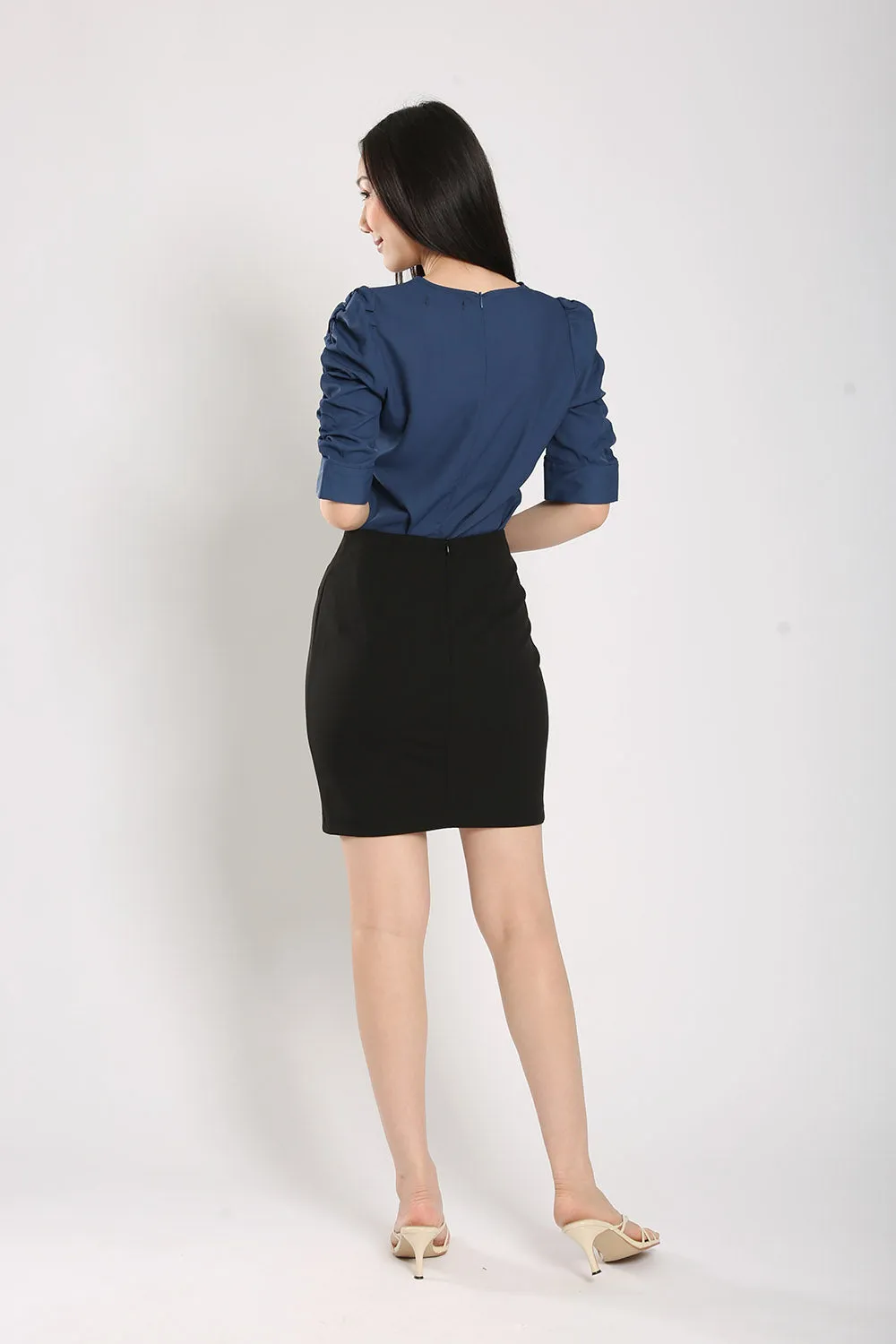 Kamille Ultra-Stretch Pencil Mini Skirt in Black